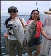 fishing-from-auckland-city-two-nice-travelly 